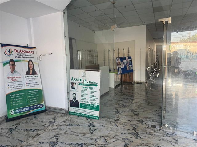 Entrance lobby with glass doors and waiting seating